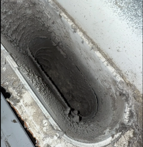 Dusty vent register before cleaning